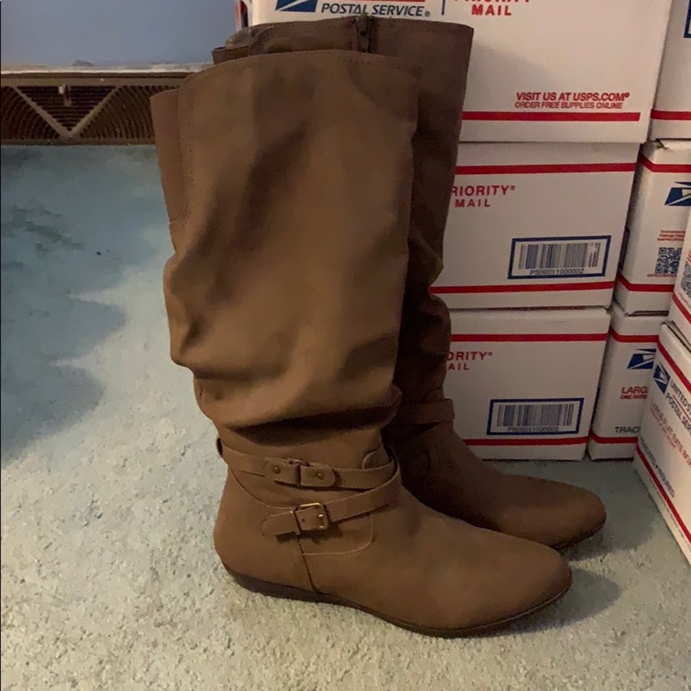 Brown knee height boots